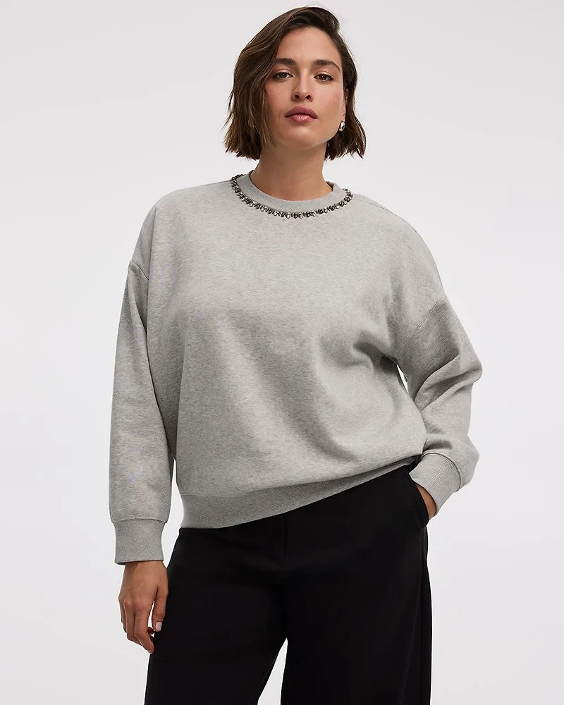 Pull en molleton à manches longues et col rond avec strass