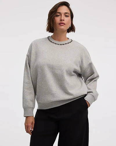 Pull en molleton à manches longues et col rond avec strass