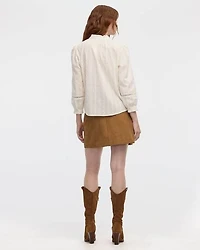 Blouse brodée à col montant