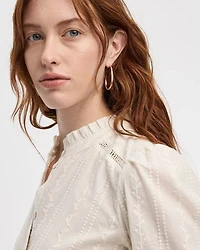 Blouse brodée à col montant