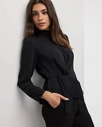Blouse péplum à manches longues et col montant