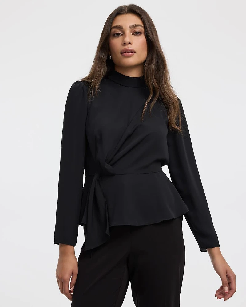 Blouse péplum à manches longues et col montant