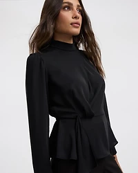 Blouse péplum à manches longues et col montant