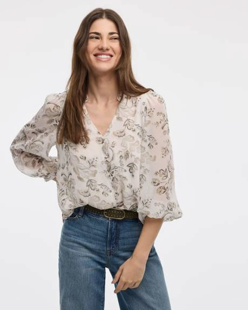 Blouse à manches volumineuses et col V