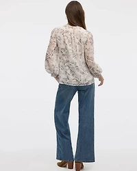 Blouse à manches volumineuses et col V