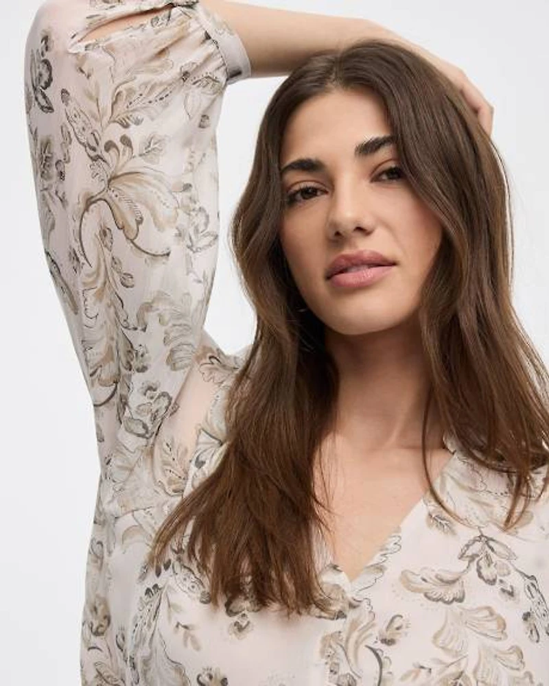 Blouse à manches volumineuses et col V
