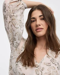 Blouse à manches volumineuses et col V