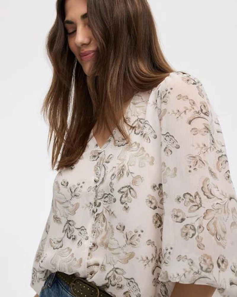 Blouse à manches volumineuses et col V