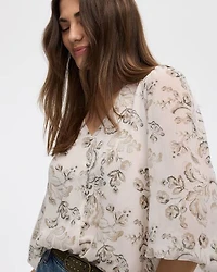 Blouse à manches volumineuses et col V