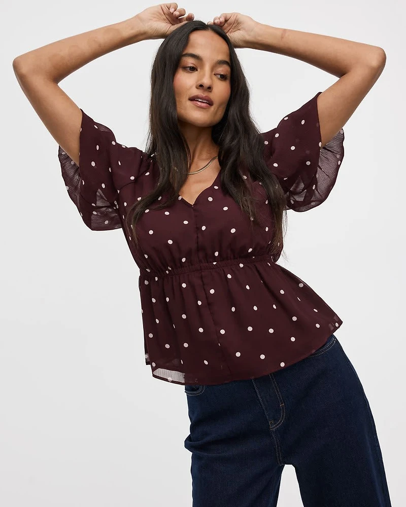 Blouse à manches courtes bouffantes et col V