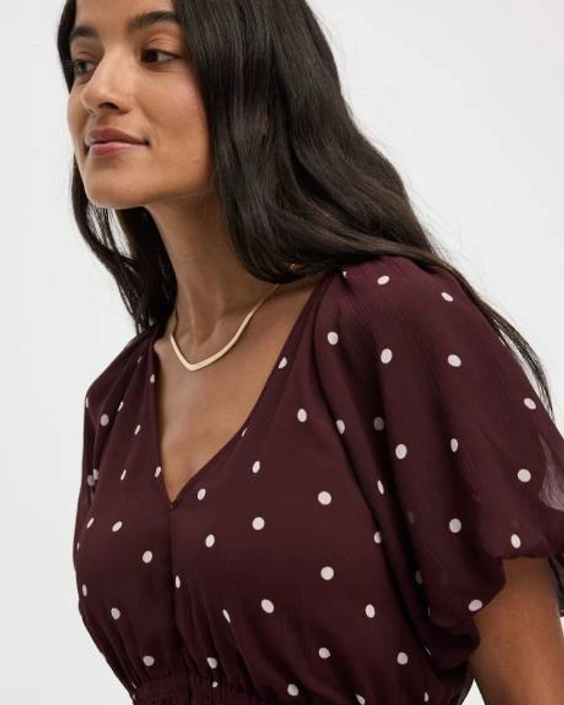 Blouse à manches courtes bouffantes et col V