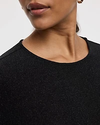 Robe courte moulante scintillante à manches longues