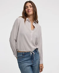 Blouse boutonnée à manches longues en tissu gaufré