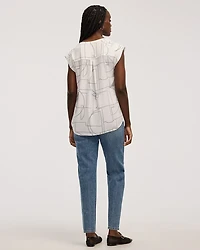 Blouse à manches très courtes et col fendu