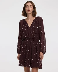 Mini-robe ballon à manches longues bouffantes et col V