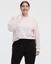 Pull à manches longues et col rond en tissu polaire