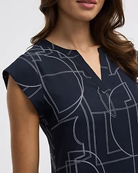 Blouse à manches très courtes et col fendu