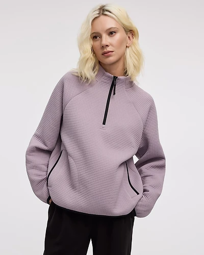 Pull à manches longues et col montant demi-zip