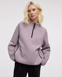 Pull à manches longues et col montant demi-zip