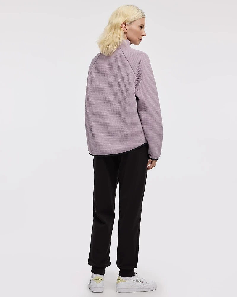 Pull à manches longues et col montant demi-zip