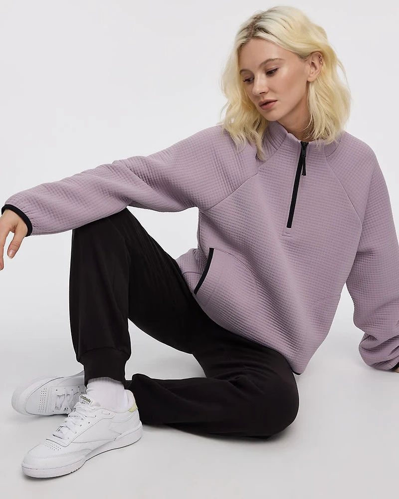 Pull à manches longues et col montant demi-zip