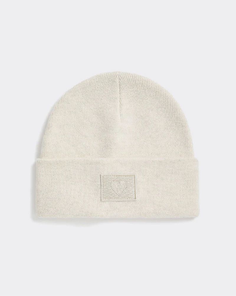 Tuque à revers avec écusson brodé