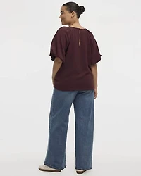 Blouse à manches courtes bouffantes et col rond