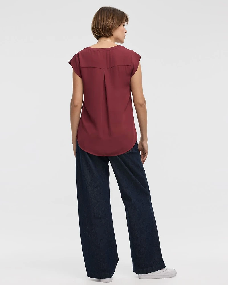 Blouse à manches très courtes et col fendu