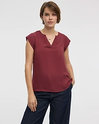 Blouse à manches très courtes et col fendu