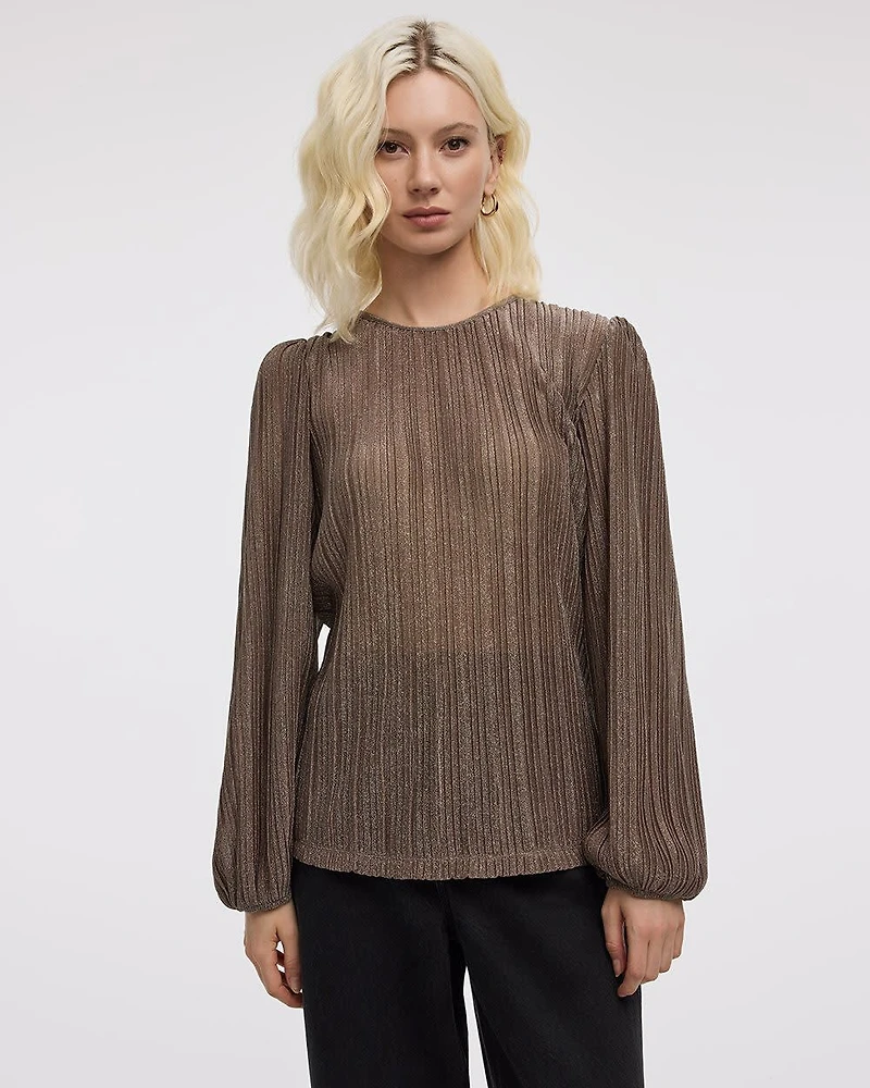 Blouse scintillante à manches longues et col rond