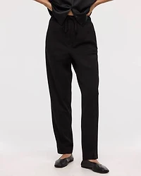 Pantalon à taille haute et jambe fuselée