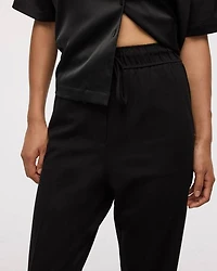 Pantalon à taille haute et jambe fuselée