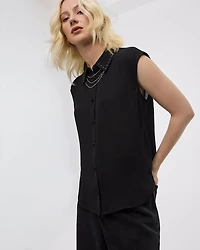 Chemise à manches très courtes avec col clouté