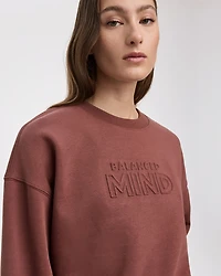 Pull en molleton avec relief