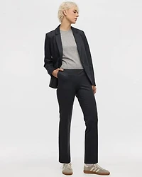 Pantalon pied-de-poule à taille haute et jambe droite