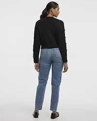 Pull à col bateau et manches longues ornées de bijoux