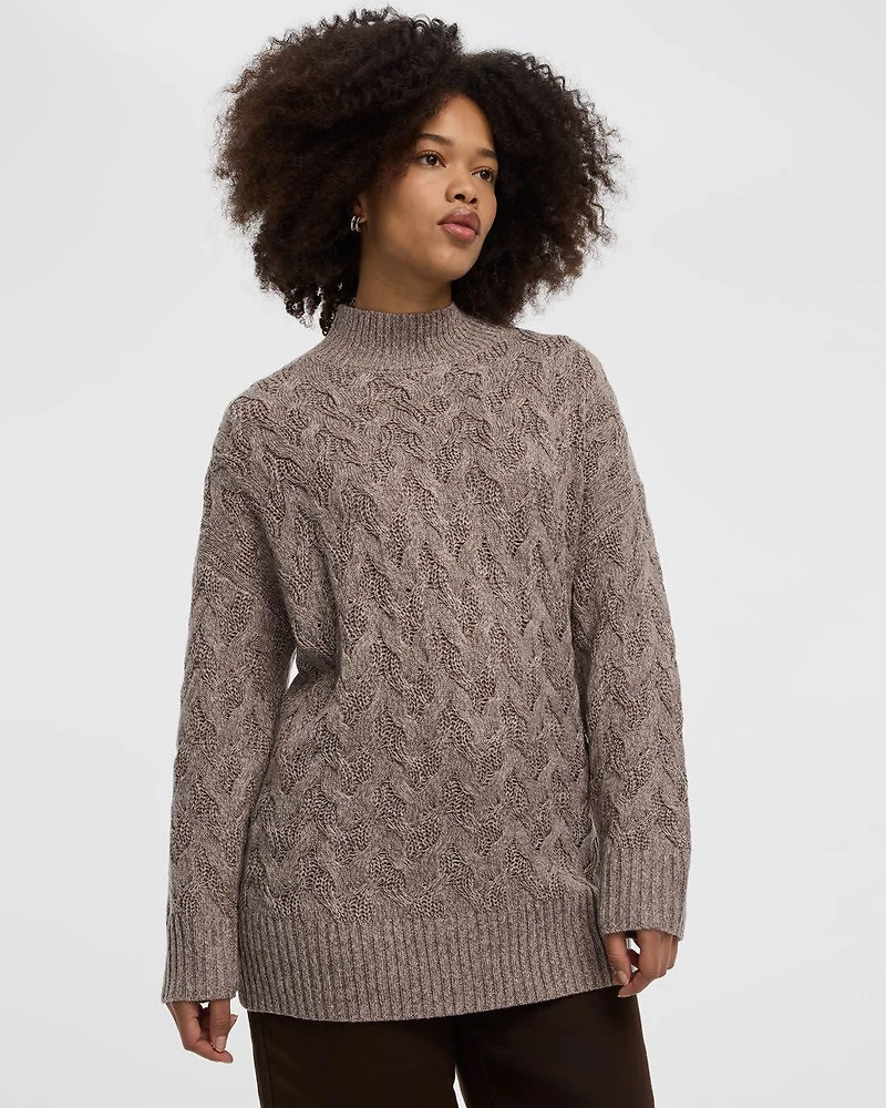 Pull à manches longues et col montant en tricot torsadé