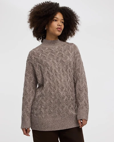 Pull à manches longues et col montant en tricot torsadé