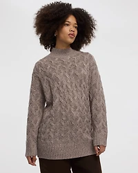 Pull à manches longues et col montant en tricot torsadé