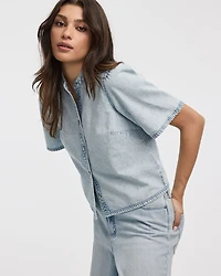 Chemise en denim à col rond et manches courtes volants