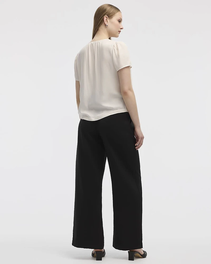 Blouse à col V et manches courtes à volants