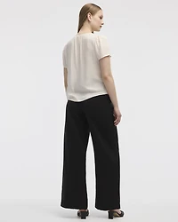 Blouse à col V et manches courtes à volants