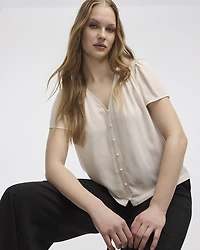 Blouse à col V et manches courtes à volants