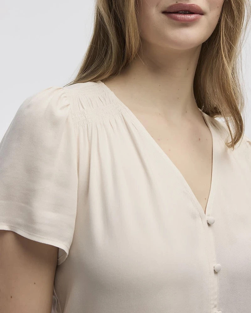 Blouse à col V et manches courtes à volants