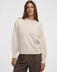 Pull à manches longues et col rond avec fleurs en soutache