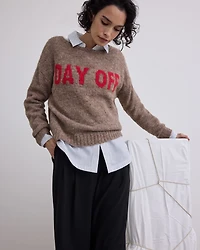 Pull ample à col bateau et manches longues