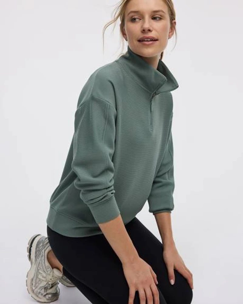 Pull à manches longues col montant demi-zip