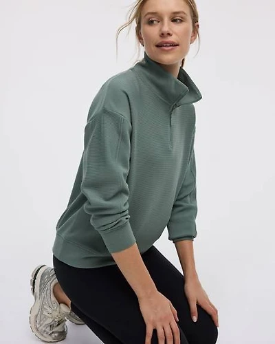 Pull à manches longues col montant demi-zip