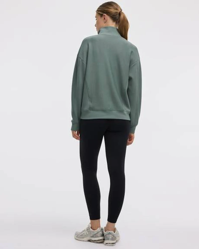 Pull à manches longues col montant demi-zip
