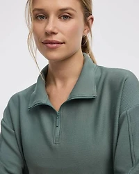 Pull à manches longues col montant demi-zip